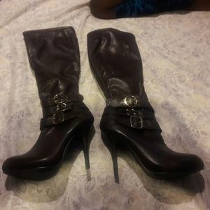 Brown wild pair knee high boots